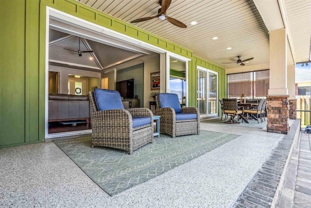 view of patio / terrace with outdoor dining area and ceiling fan