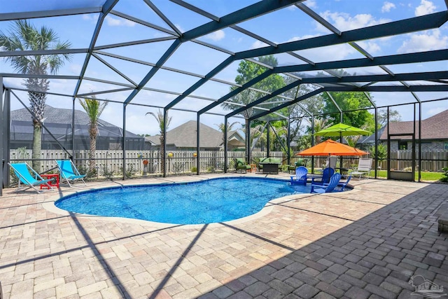 view of swimming pool featuring a patio, a fenced backyard, and a fenced in pool