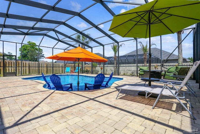 view of swimming pool with a fenced in pool, a fenced backyard, and a patio area