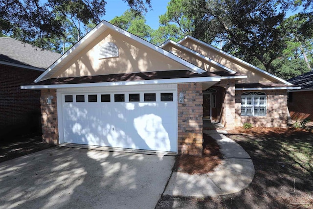 view of front of home with a garage