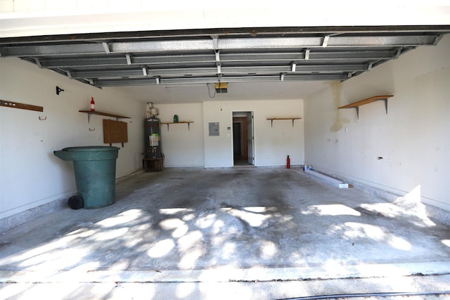 garage featuring electric panel and gas water heater