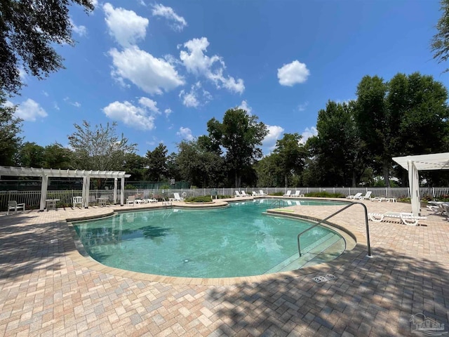 view of pool featuring a patio area and a pergola