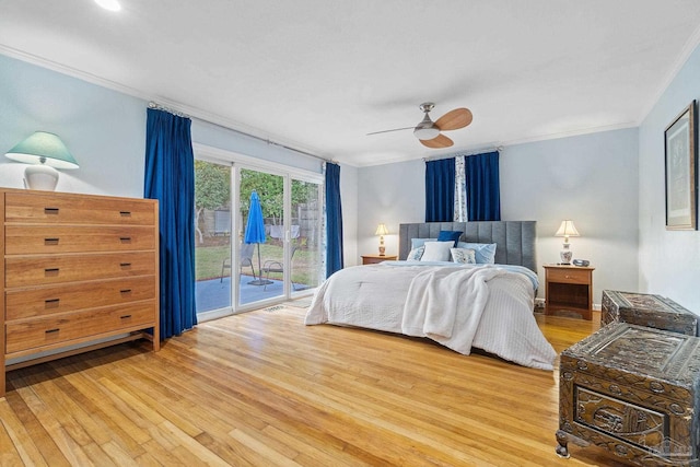 bedroom with ceiling fan, light hardwood / wood-style floors, access to exterior, and crown molding