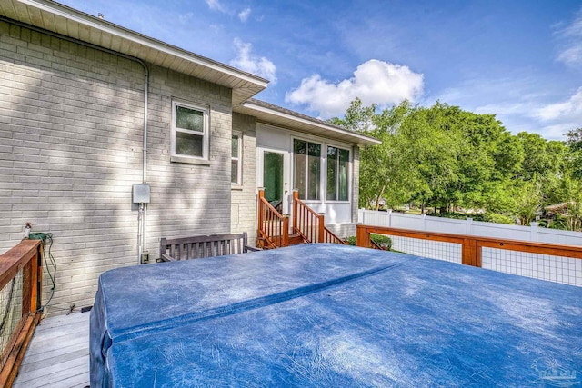 wooden deck with entry steps and fence