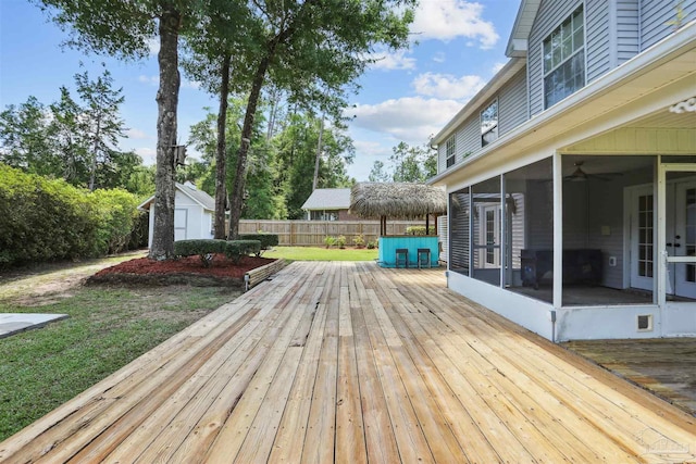 2724 Ashbury Ln, Cantonment, FL 32504 - wooden deck featuring a sunroom and a storage unit