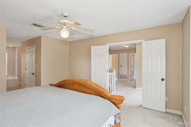 2724 Ashbury Ln, Cantonment, FL 32504 - bedroom featuring light carpet, ceiling fan, and a textured ceiling