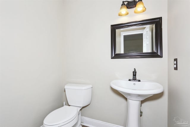 2724 Ashbury Ln, Cantonment, FL 32504 - half bathroom with toilet and baseboards