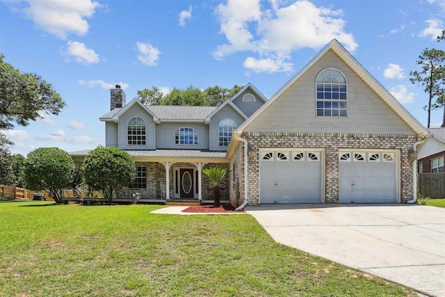 2724 Ashbury Ln, Cantonment, FL 32504 - traditional home featuring driveway, a chimney, a porch, and brick siding