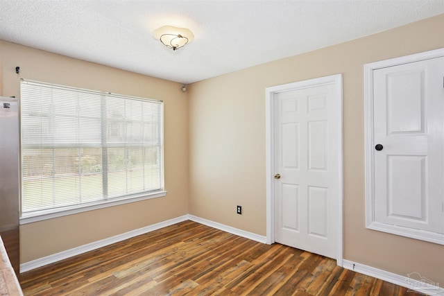 2724 Ashbury Ln, Cantonment, FL 32504 - unfurnished bedroom featuring wood finished floors and baseboards