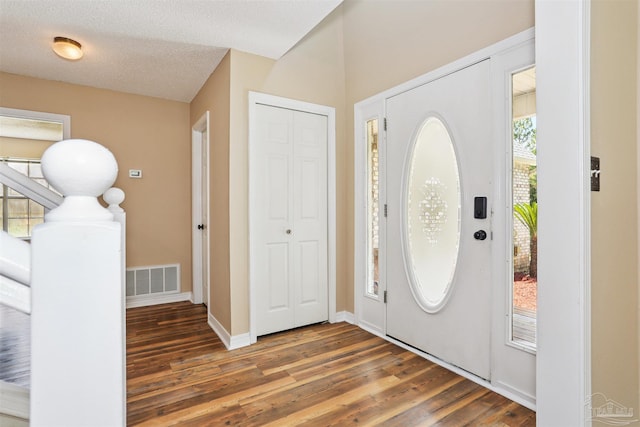 2724 Ashbury Ln, Cantonment, FL 32504 - foyer entrance featuring wood finished floors