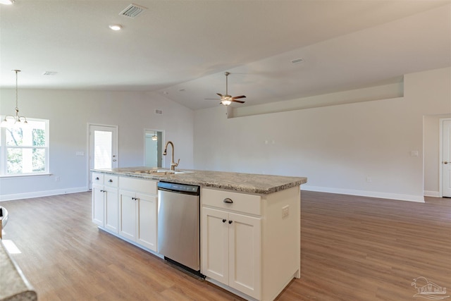 kitchen featuring lofted ceiling, a kitchen island with sink, light hardwood / wood-style flooring, stainless steel dishwasher, and white cabinets