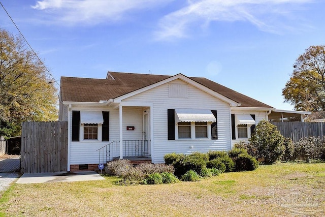 view of front of home with a front yard