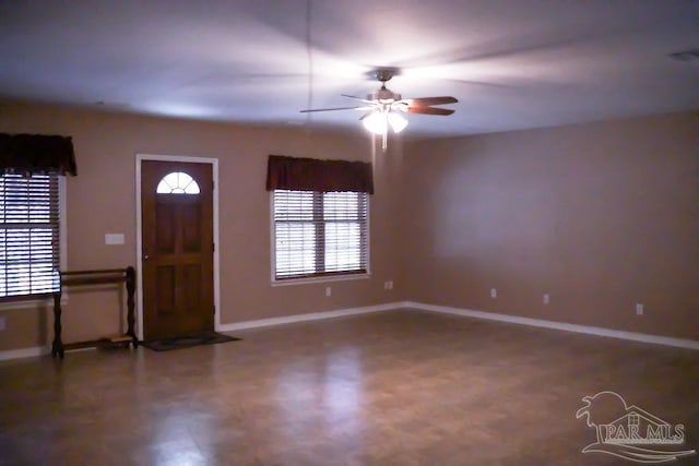 entrance foyer featuring ceiling fan