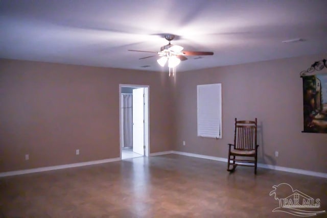 spare room with ceiling fan