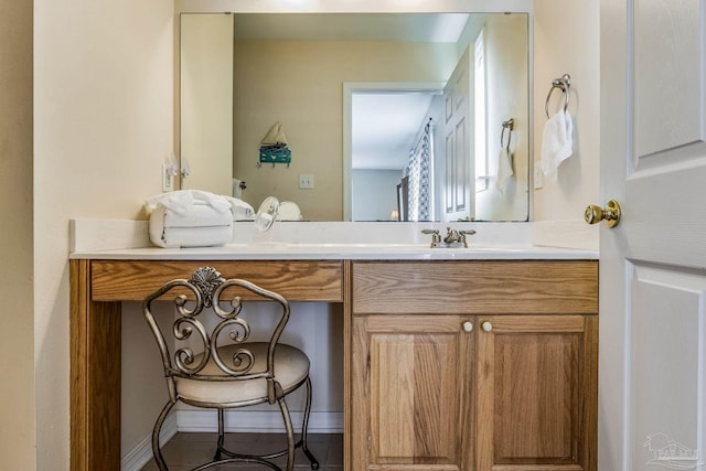 bathroom featuring vanity and tile patterned flooring