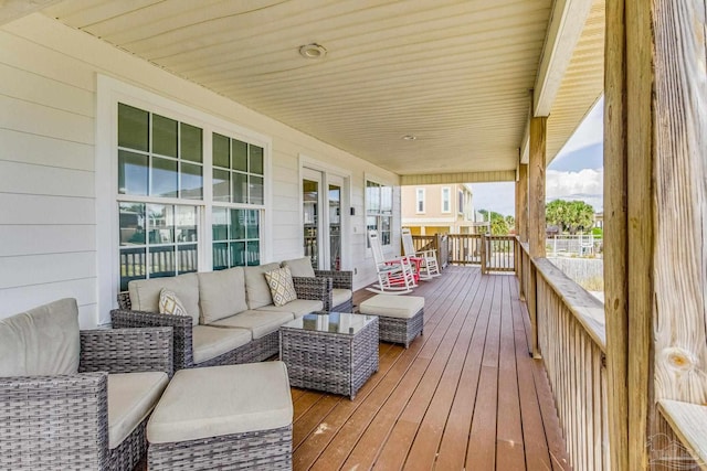 wooden deck with outdoor lounge area