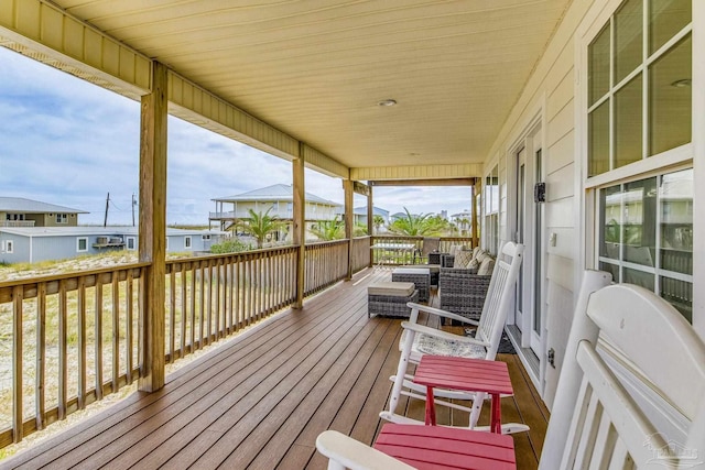 wooden deck with a residential view