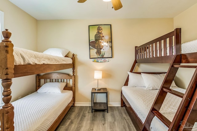 bedroom featuring dark hardwood / wood-style floors and ceiling fan