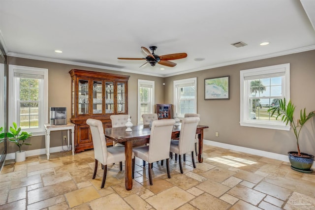 dining area with ceiling fan, ornamental molding, and plenty of natural light