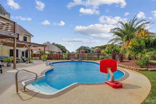 view of pool featuring a pergola and a patio area