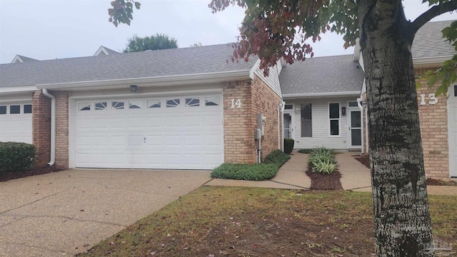 ranch-style house featuring a garage