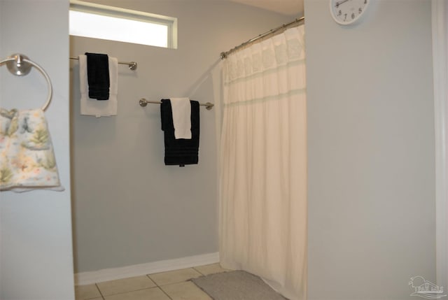 bathroom with tile patterned flooring