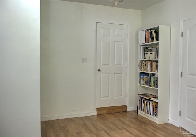 spare room featuring light hardwood / wood-style flooring