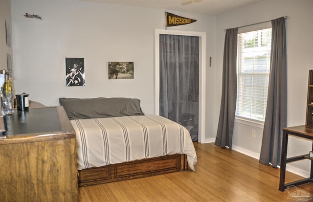 bedroom featuring hardwood / wood-style flooring