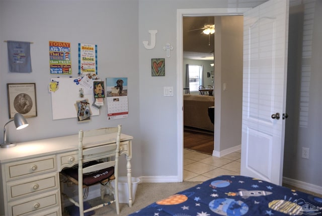 bedroom featuring light tile patterned flooring