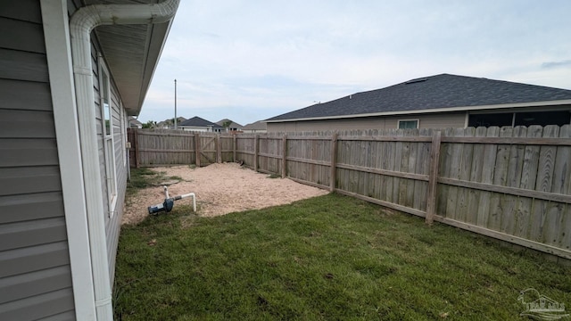 view of yard featuring a fenced backyard