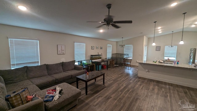 living area with dark wood finished floors, recessed lighting, a ceiling fan, vaulted ceiling, and baseboards