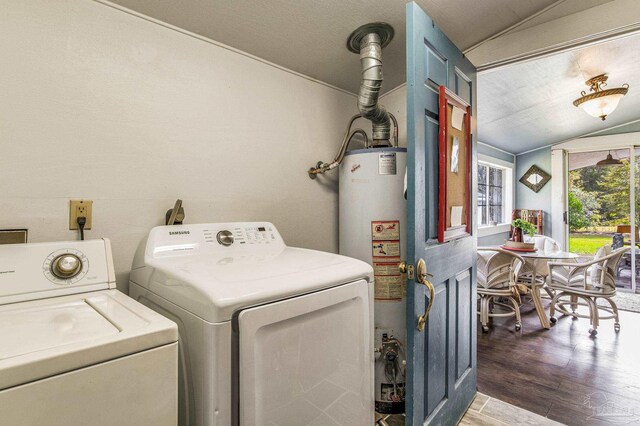 110 Glover Rd, Century, FL 32535 - laundry area featuring washer and clothes dryer, water heater, and wood finished floors