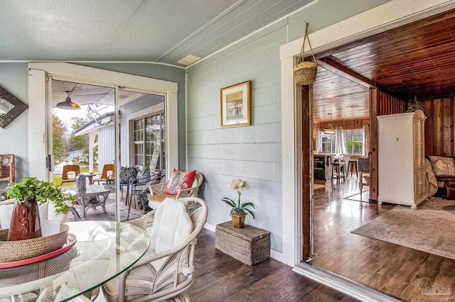 110 Glover Rd, Century, FL 32535 - dining space with wood finished floors, lofted ceiling, and wood walls