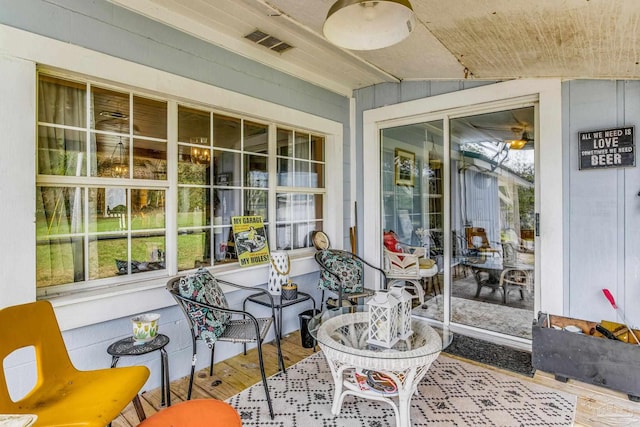 110 Glover Rd, Century, FL 32535 - sunroom with wood finished floors and lofted ceiling
