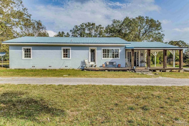 110 Glover Rd, Century, FL 32535 - ranch-style home featuring a front lawn, metal roof, a porch, and crawl space