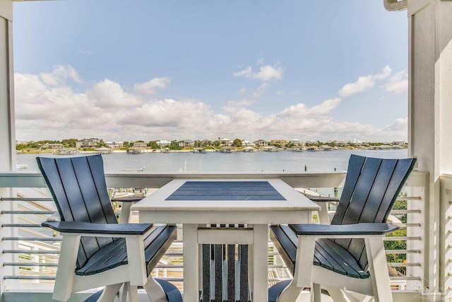 view of patio featuring a water view