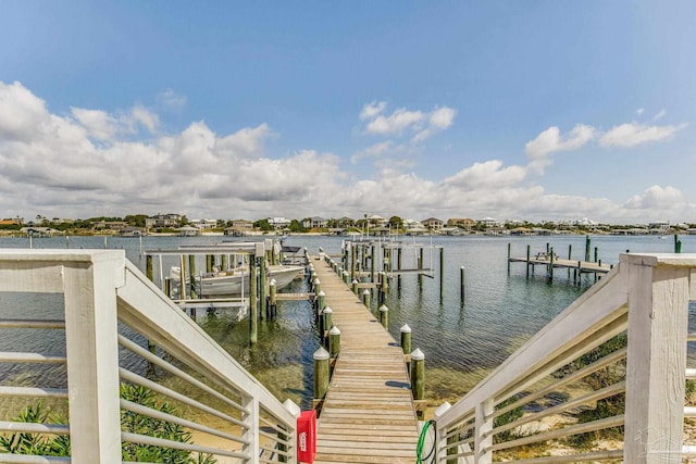 view of dock with a water view and boat lift