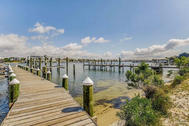 view of dock with a water view and boat lift