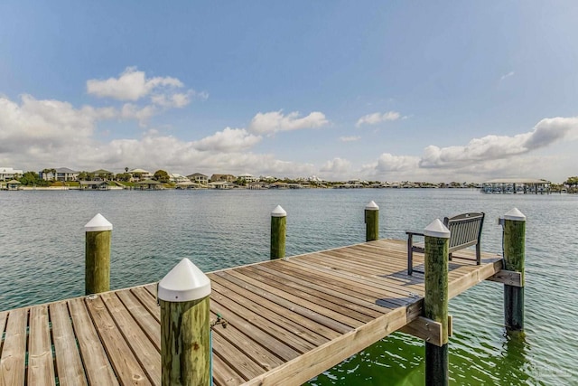 dock area with a water view