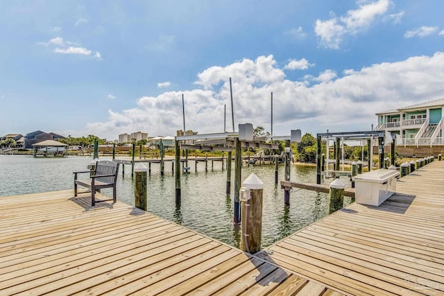 view of dock with a water view and boat lift