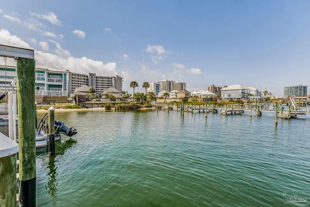 property view of water with a dock