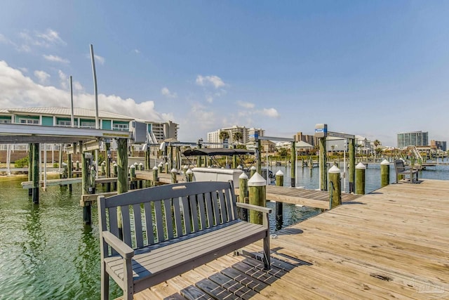 view of dock featuring a water view and boat lift