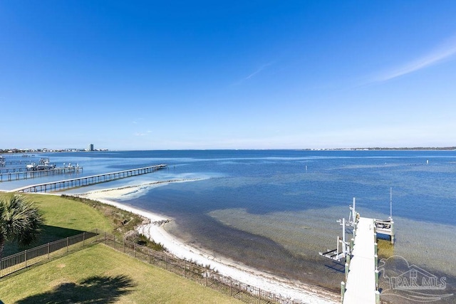 106 Matamoros Dr, Pensacola Beach, FL 32561 - property view of water featuring boat lift, fence, and a dock