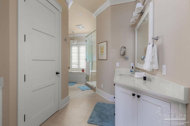 106 Matamoros Dr, Pensacola Beach, FL 32561 - bathroom featuring tile patterned flooring, vanity, baseboards, and a shower stall