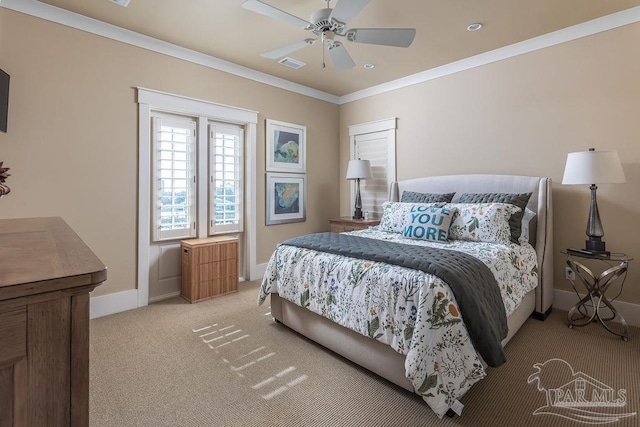 106 Matamoros Dr, Pensacola Beach, FL 32561 - bedroom featuring visible vents, crown molding, baseboards, a ceiling fan, and light carpet