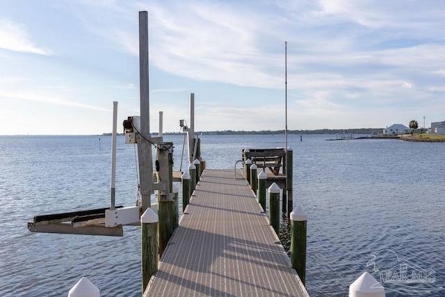 106 Matamoros Dr, Pensacola Beach, FL 32561 - view of dock with boat lift and a water view