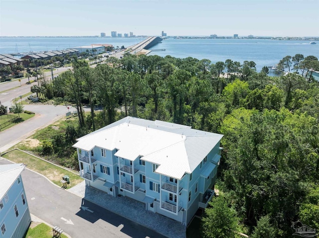 birds eye view of property with a water view