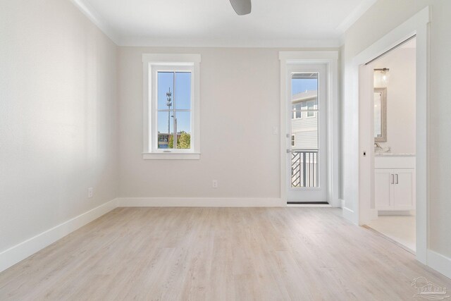 unfurnished room with light hardwood / wood-style floors