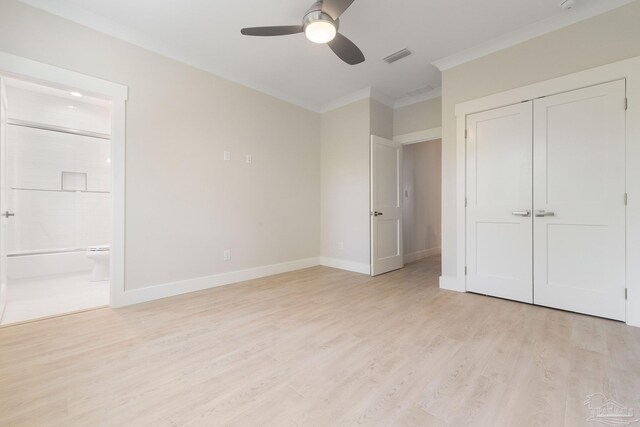 unfurnished bedroom with ceiling fan, connected bathroom, light hardwood / wood-style floors, and a closet