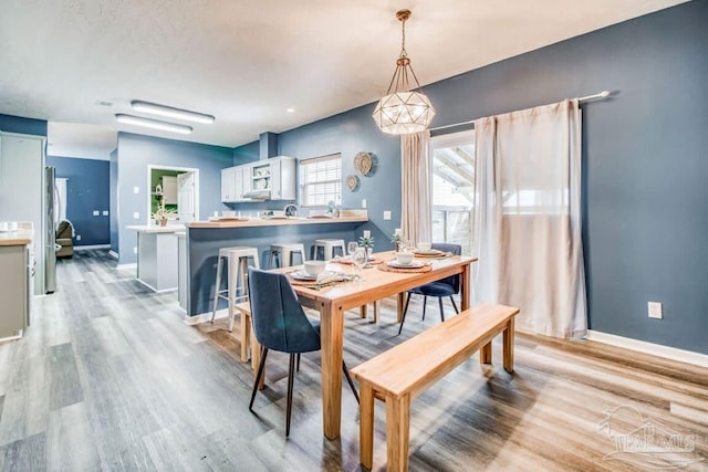 dining room featuring light hardwood / wood-style flooring